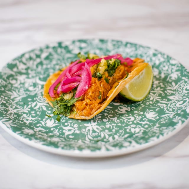 Spicy chicken tinga taco.
